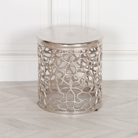 aluminium side table with unusual metal pattern with see through sections underneath